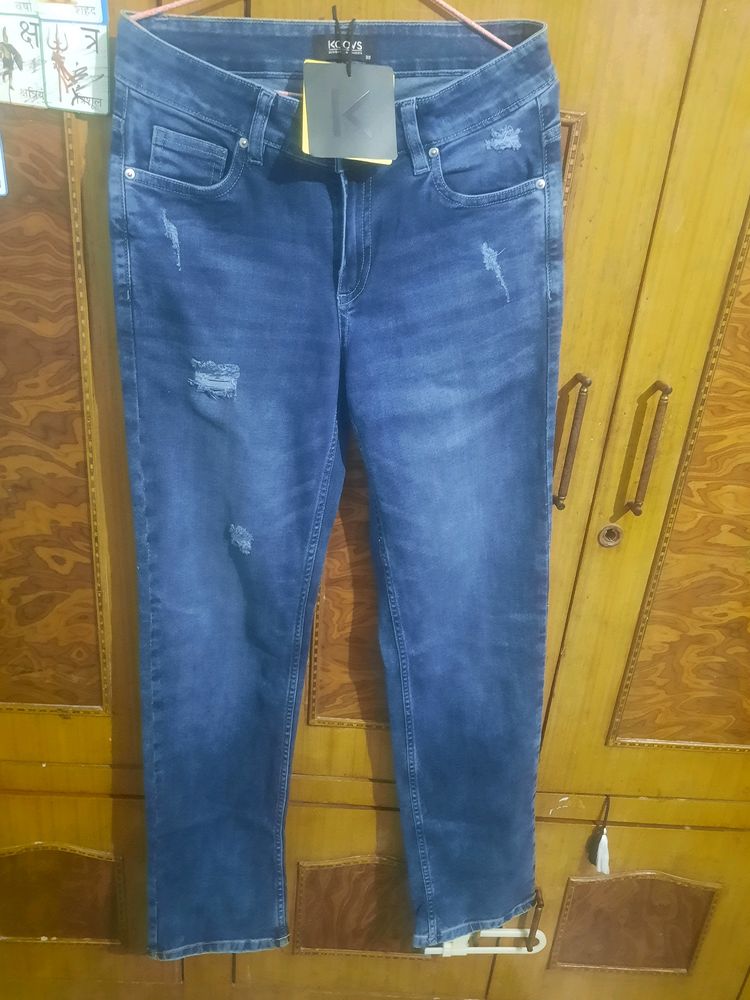 Distressed Slim Fit Jeans