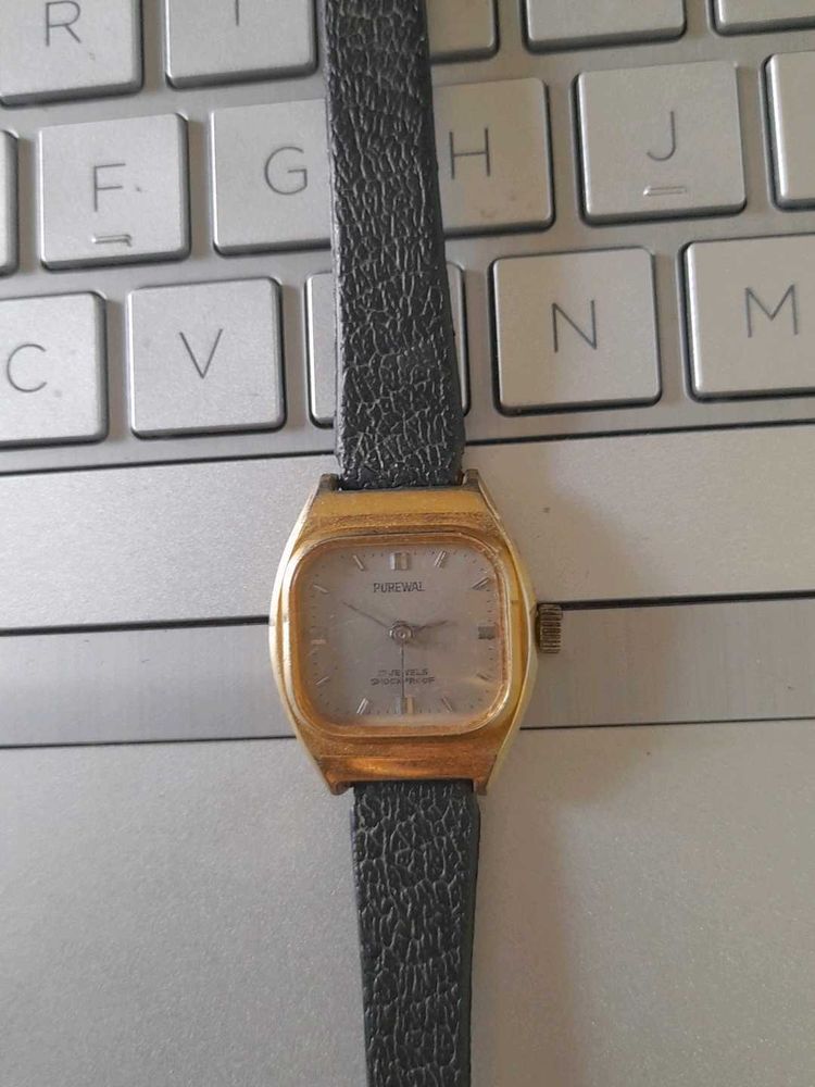 Vintage Gold Tone Watch with Black Leather Strap