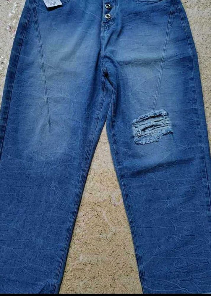 Distressed Blue Denim Jeans