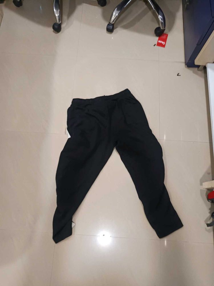Comfortable Black Pants with white strips on the s