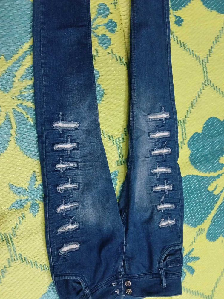 Ripped Blue Denim Jeans