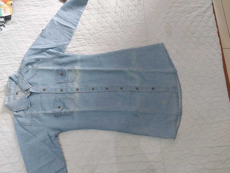 Light Wash Denim one piece with open buttons