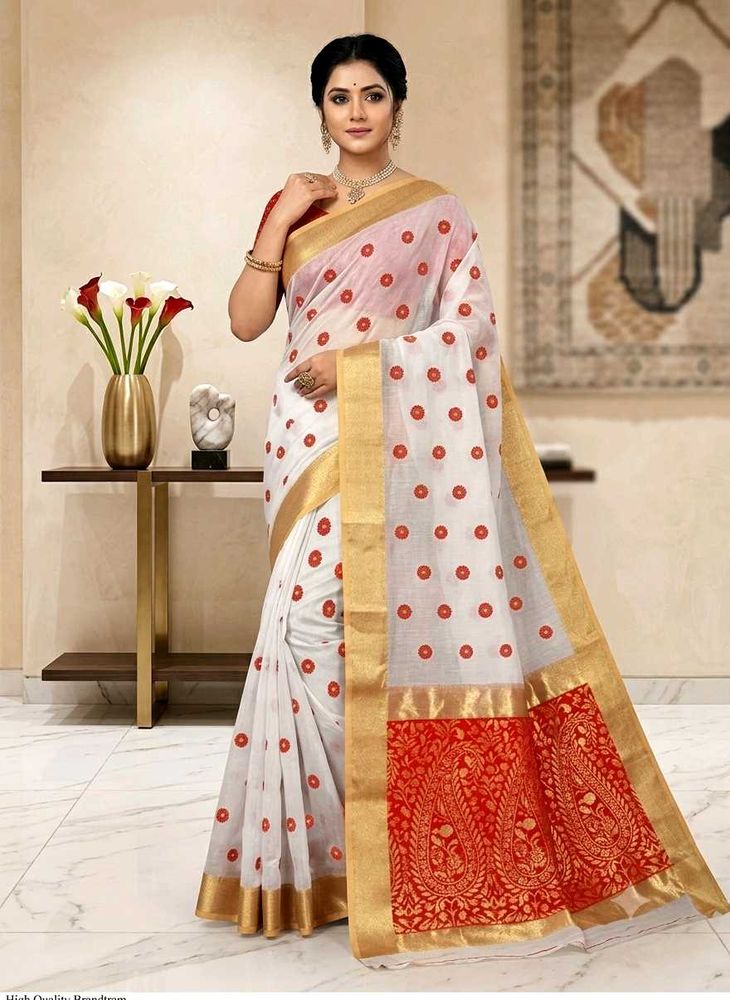 Elegant White Saree with Red &amp; Gold Accents
