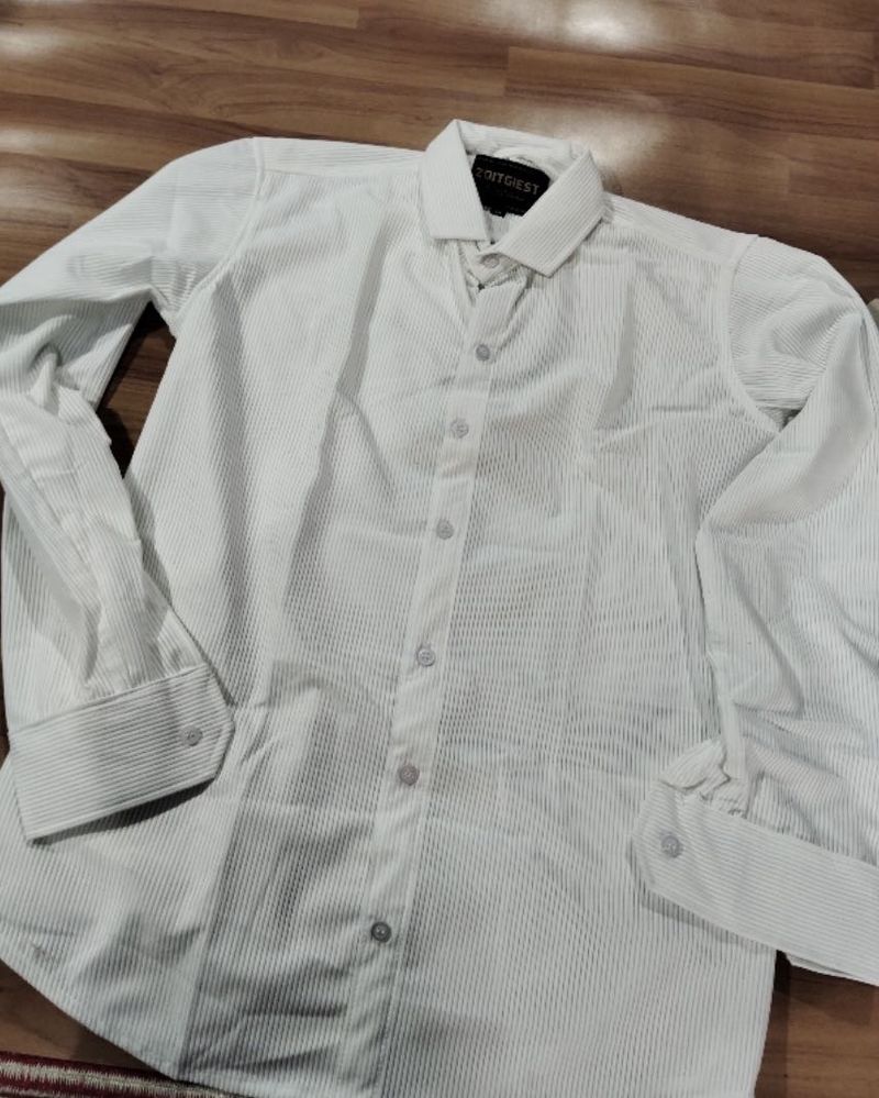 new shirt with tag comment your size