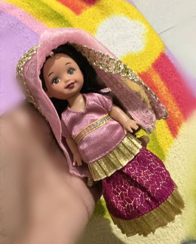 Ethnic Doll and a cow plushie