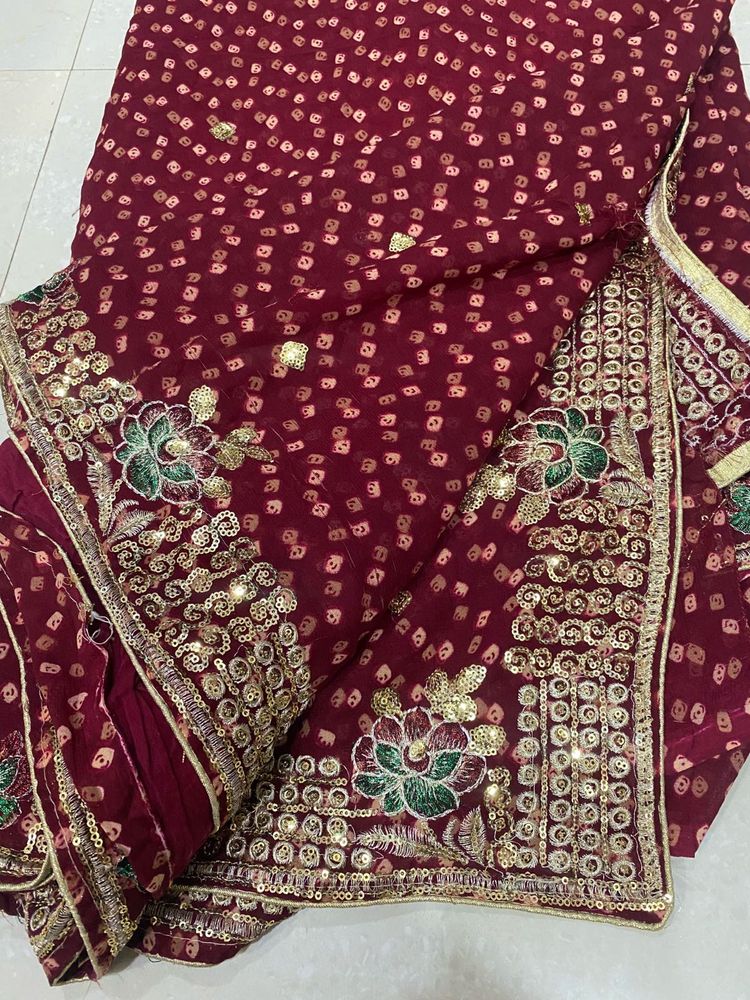 Maroon Bandhani Saree with Gold Border