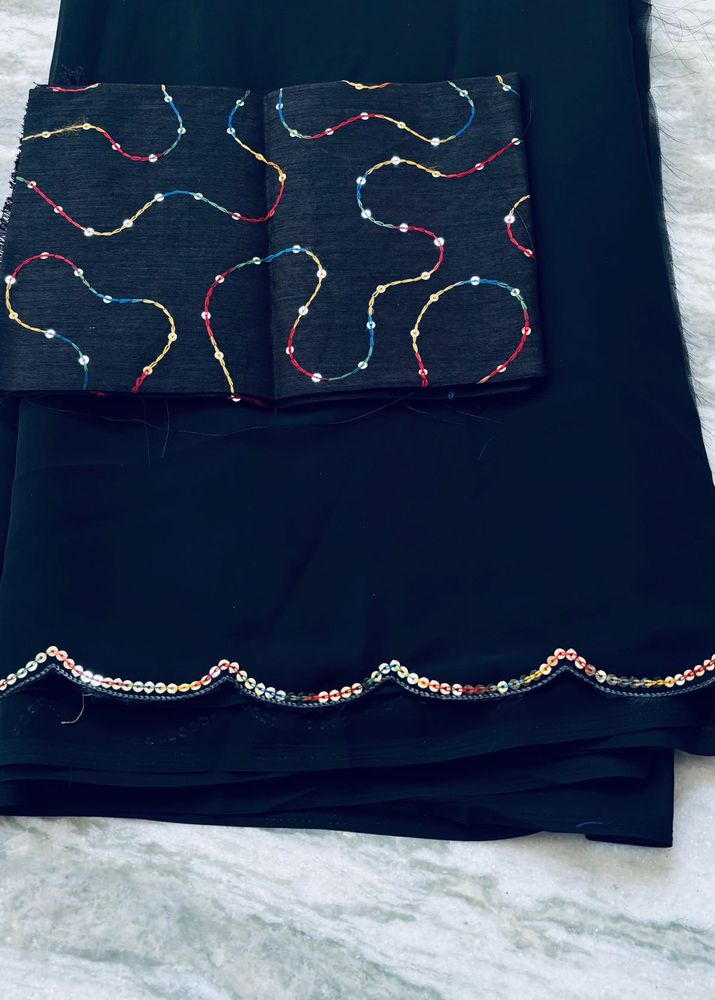 Elegant Black Saree with Colorful Border