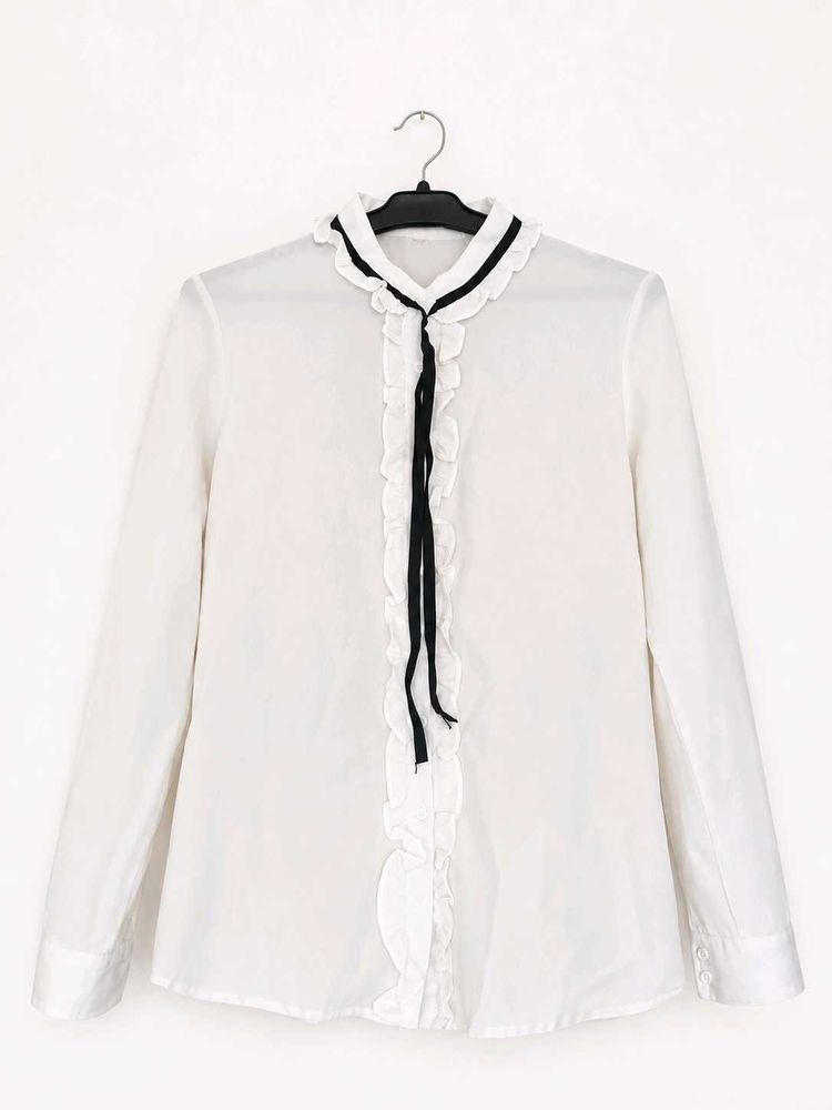 White Ruffled Blouse with Black Ribbon