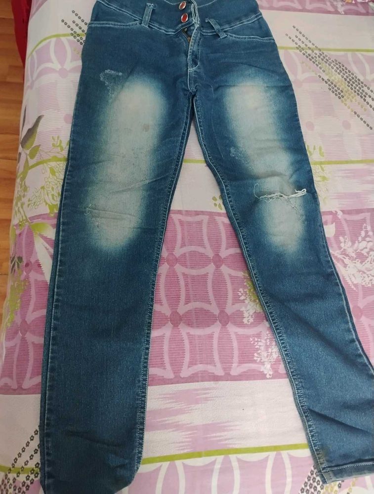 Distressed Blue Denim Jeans