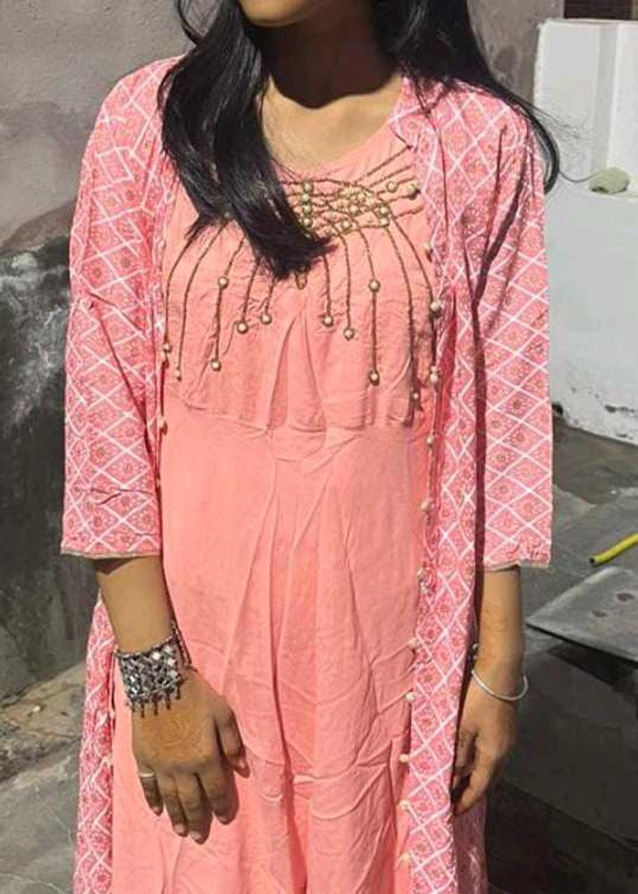 Elegant Pink Kurta Set with Embellished Neckline