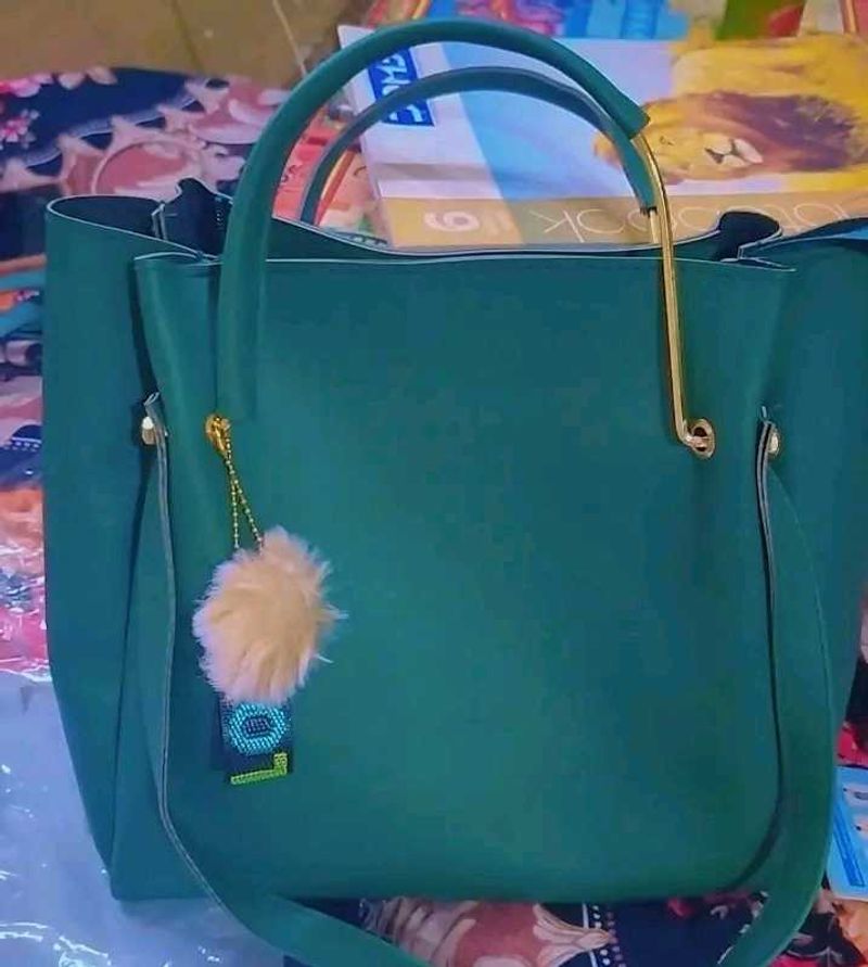 Stylish Teal Handbag with Charm