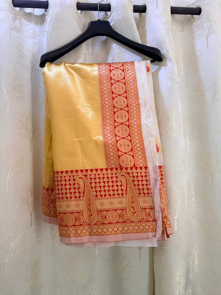 Elegant White Saree with Golden Border