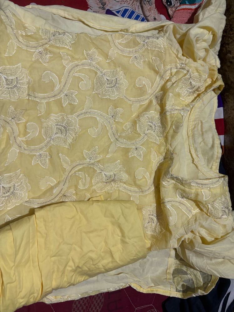 Elegant Yellow Kurta Set with Intricate Embroidery