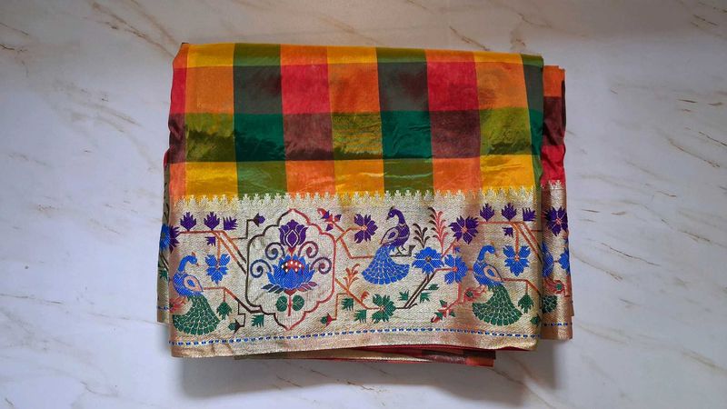 Vibrant Checked Silk Saree with Peacock Border