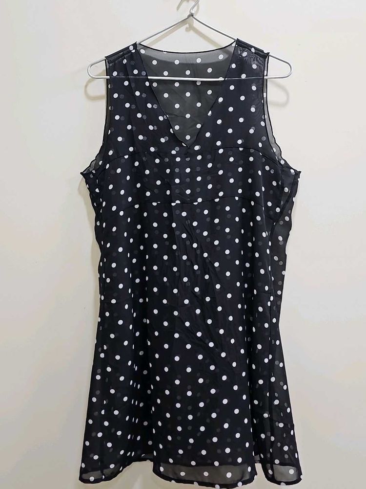 Polka dot sheer top