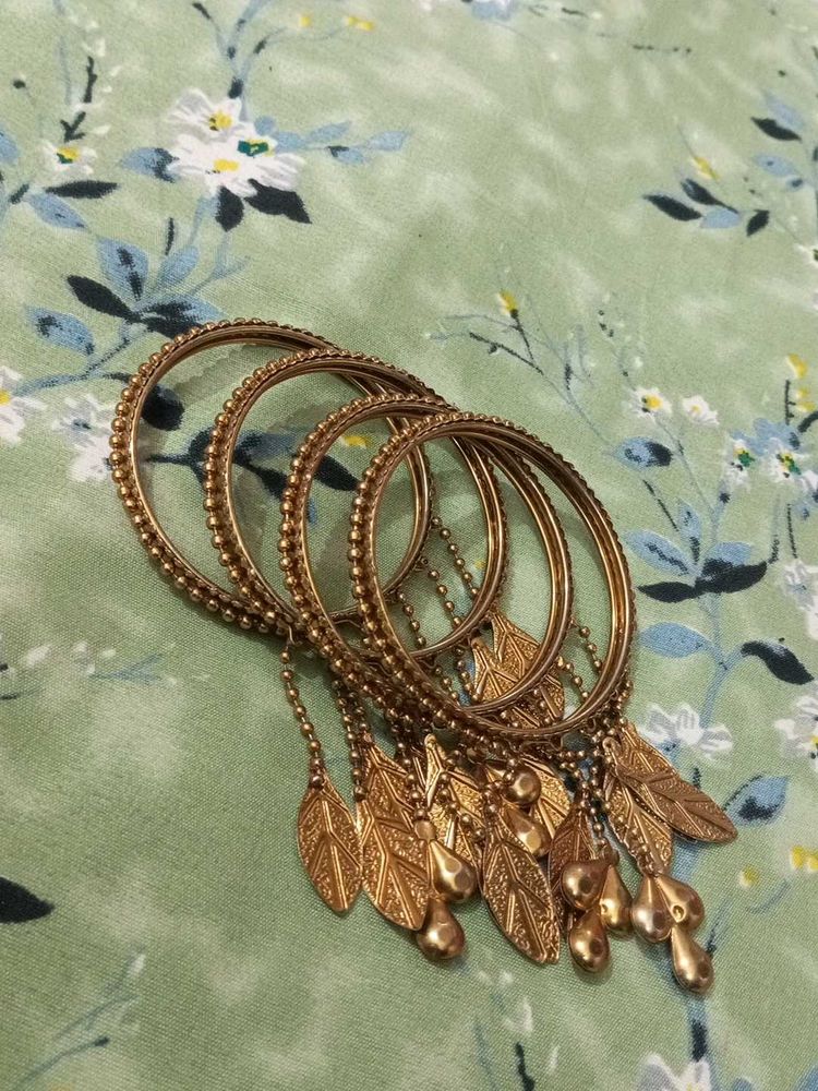 Elegant Gold-Toned Bangle Set with Leaf Charms