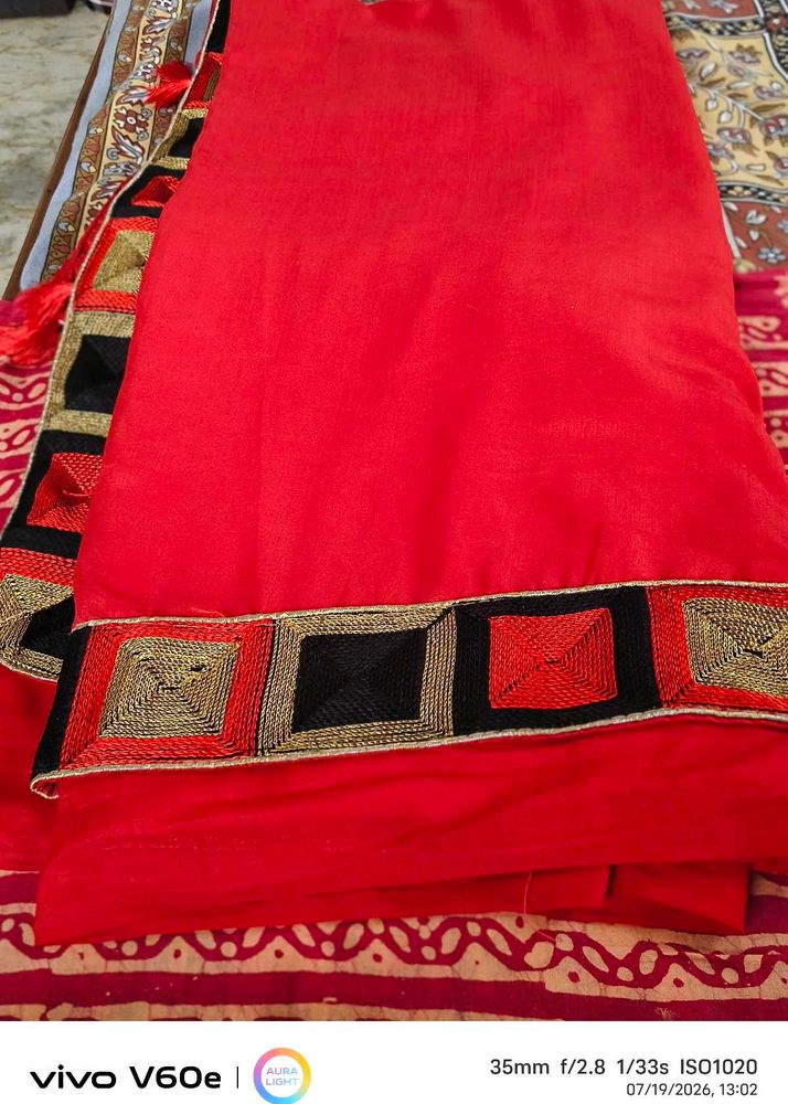 Vibrant Red Saree with Embellished Border