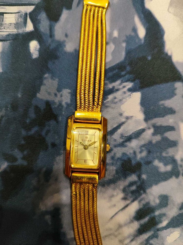 Elegant Gold Titan Watch