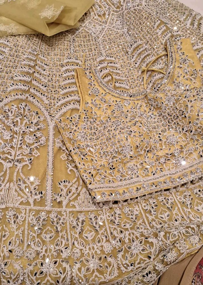 Exquisite Yellow Mirror Work Lehenga Choli