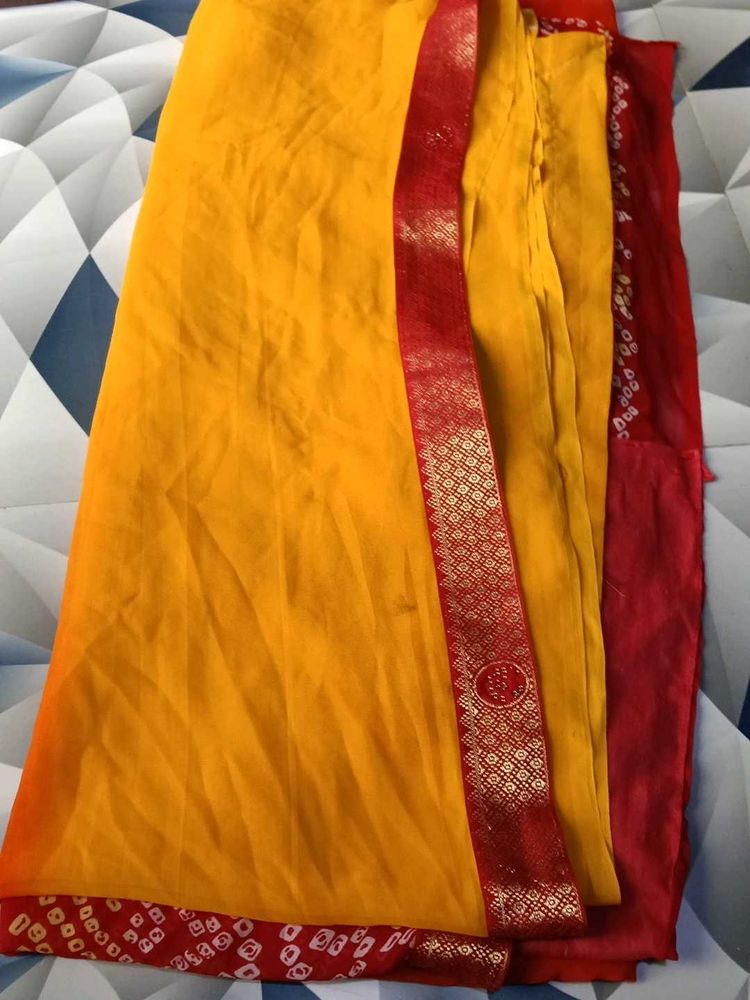 Vibrant Yellow Saree with Red Border