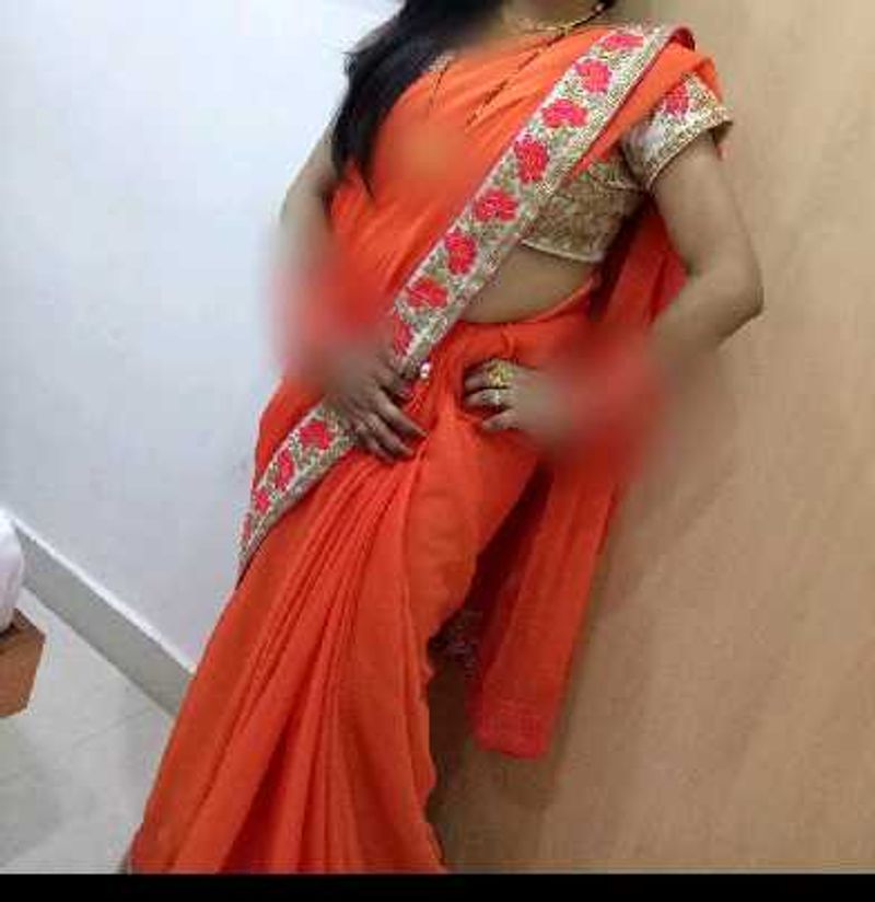 Vibrant Orange Saree with Embellished Border