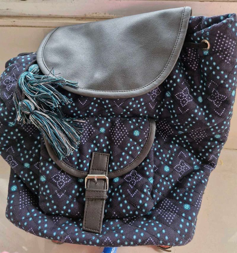 Quilted Backpack with Tassels
