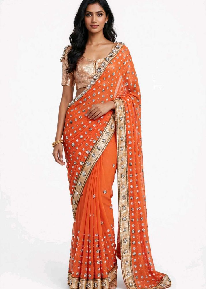Stunning Orange Embellished Saree