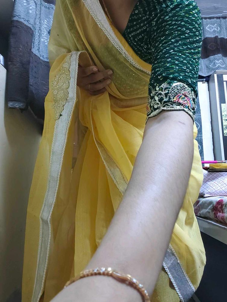 Vibrant Yellow Saree with paisley motifs