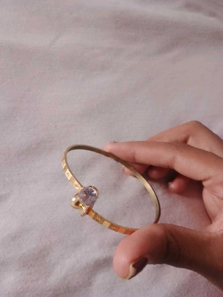 Elegant Gold Bangle with Crystal Accent