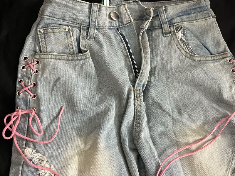 Distressed Denim Jeans with Pink Laces