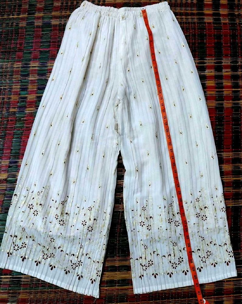 Elegant White Palazzo Pants with Floral Detail