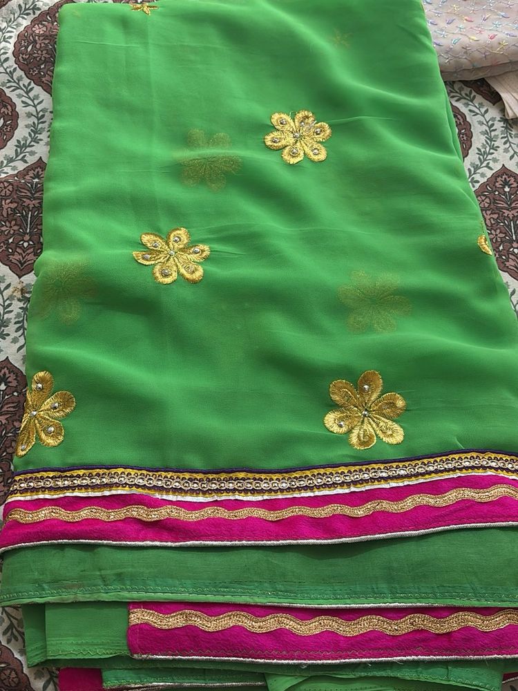 Vibrant Green Saree with Gold Embroidery