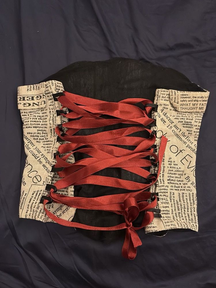newspaper print corset with boning