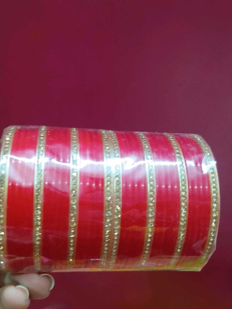 Red Bangles with Golden Embellishments