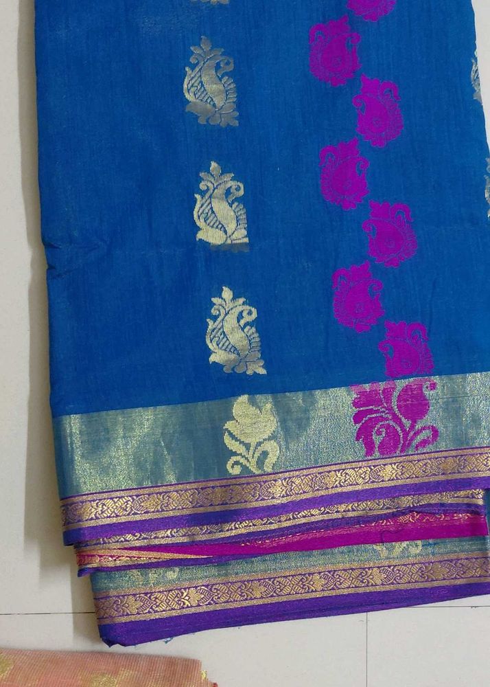 Vibrant hand woven Blue Saree with Peacock Motifs