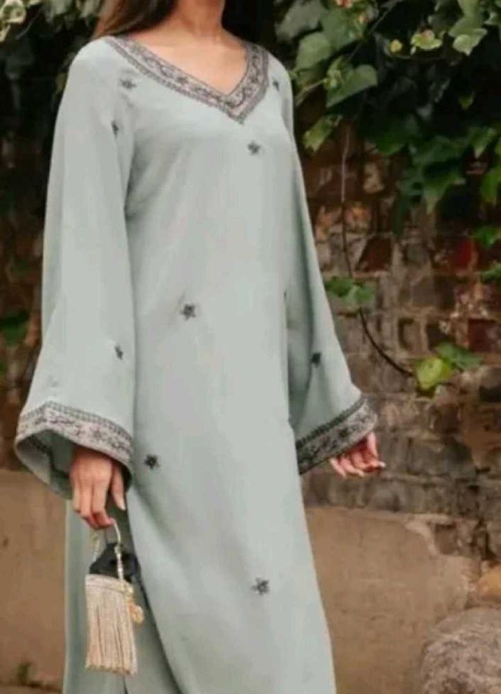 Elegant Light green Kurta with Intricate Neckline