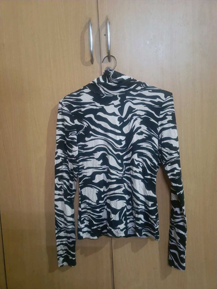 Zebra Print Turtleneck Top