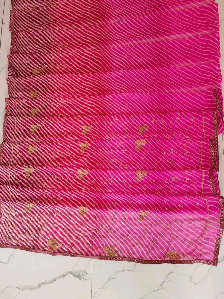 Vibrant Pink Leheriya Saree with Golden Buti