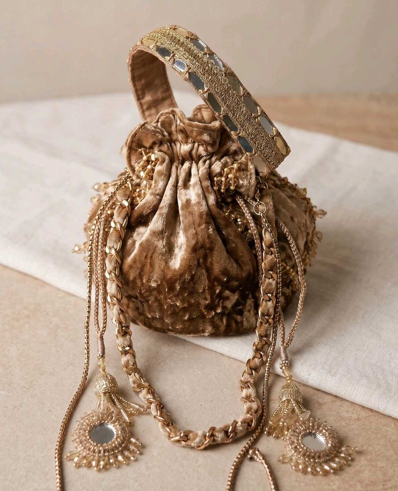 Elegant Embellished  velavte tassels Potli Bag