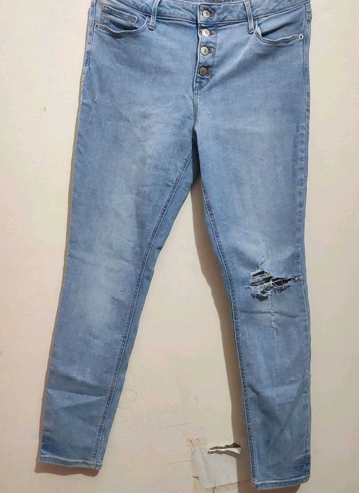 Light Wash Ripped Button Fly Jeans