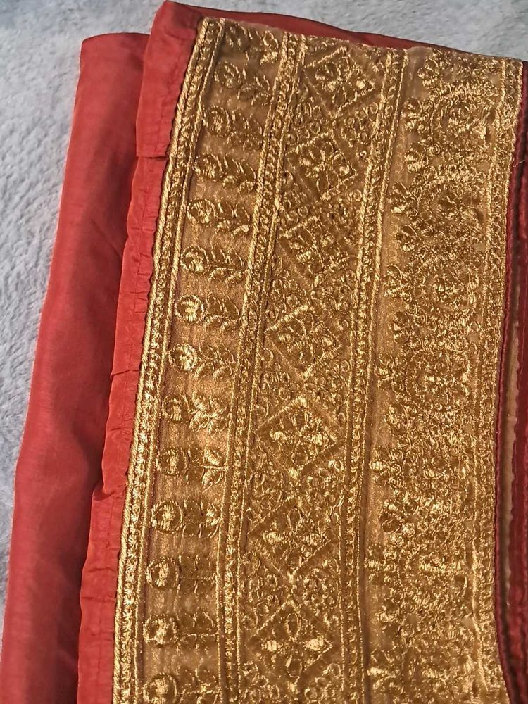 Elegant Red Saree with Gold Border