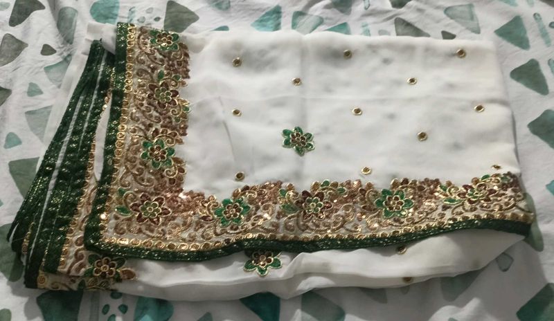 Elegant White Saree with Embellishments