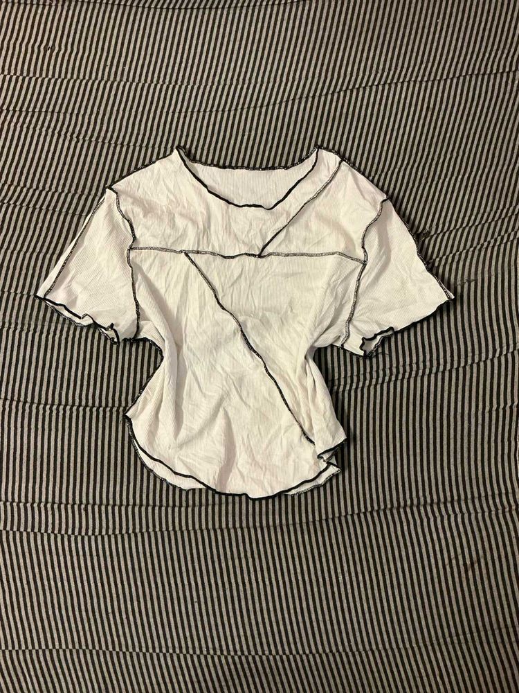 White Top with Black Stitch Detail