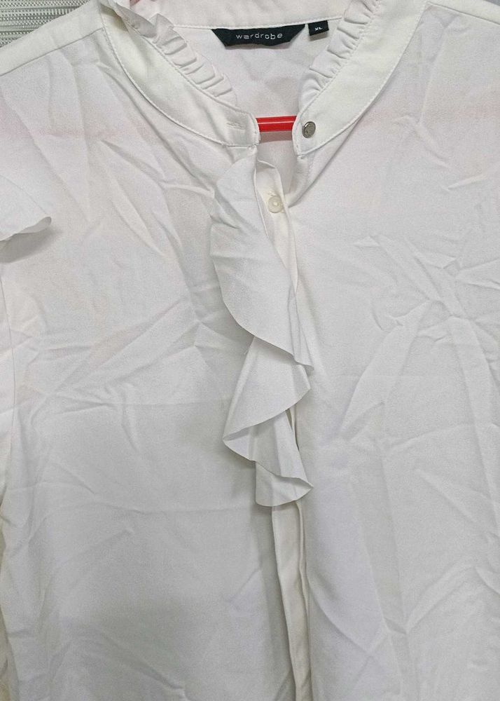 Chic White Ruffle Front Top of westside brand