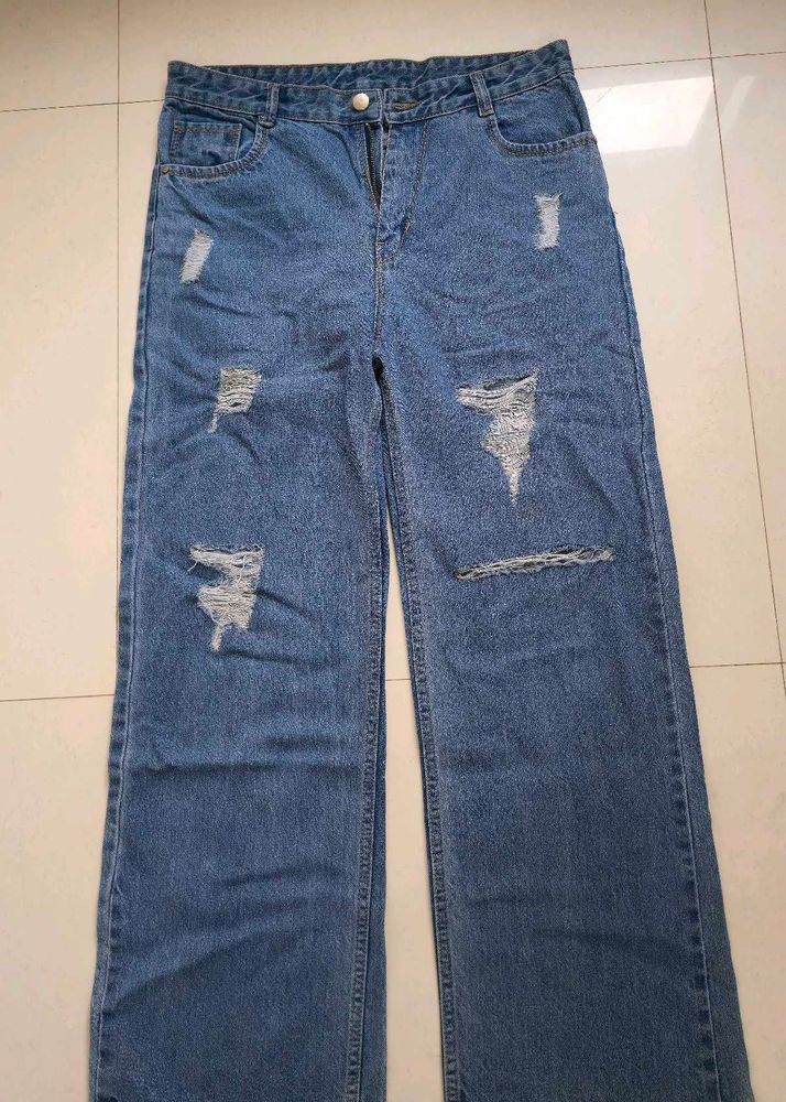 Ripped Wide Leg Denim Jeans