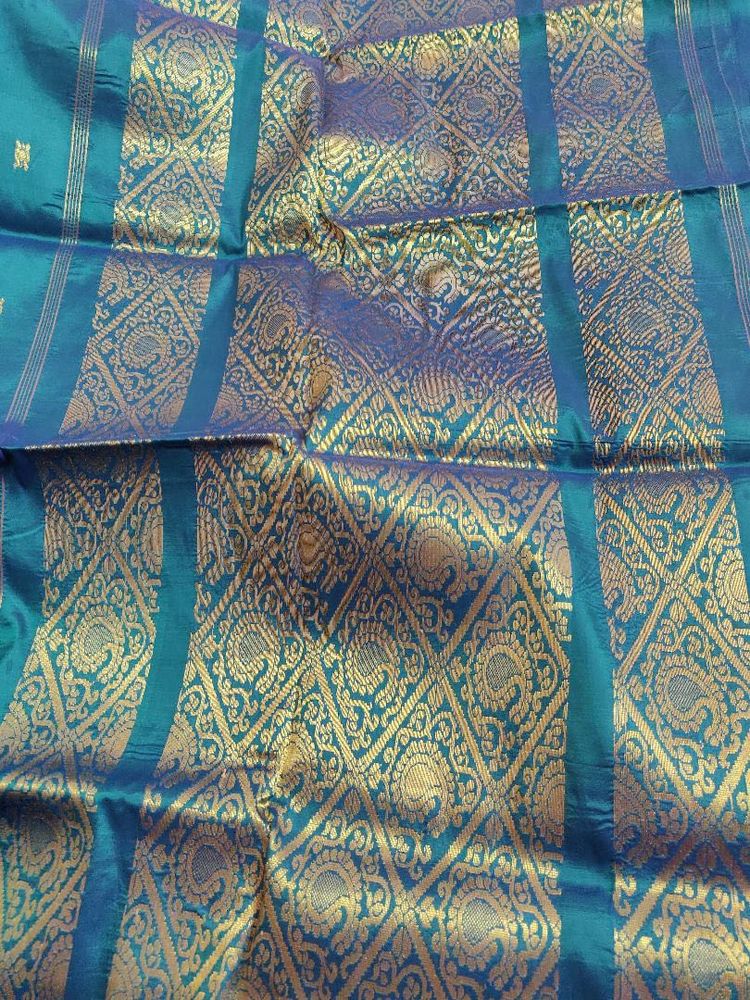 Elegant Teal Saree with Gold Border