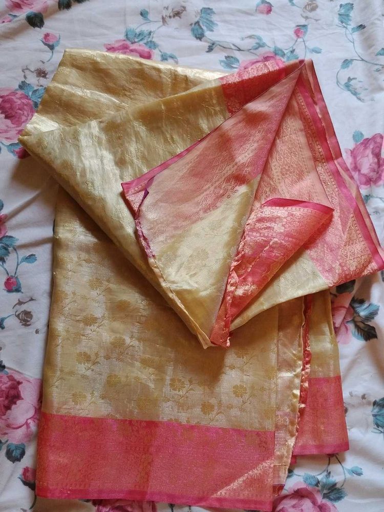 Elegant Gold Saree with Pink Border