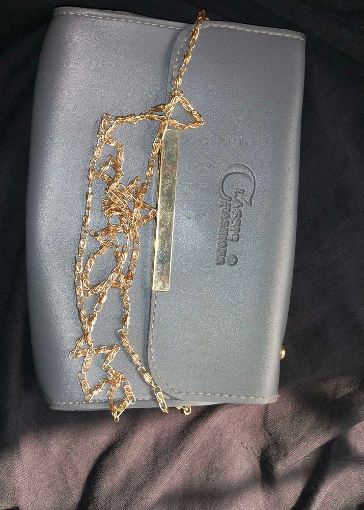 Elegant Gray Clutch with Gold Chain