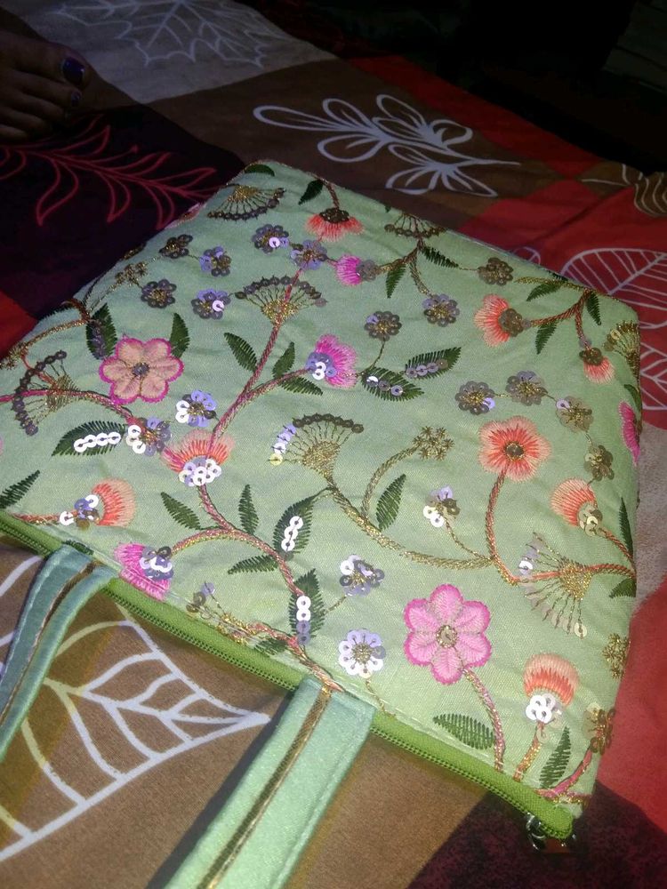 A Beautiful Handbag With Embroidery Design