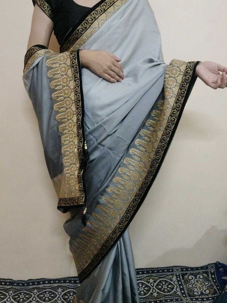 Elegant Grey Saree with Gold Border
